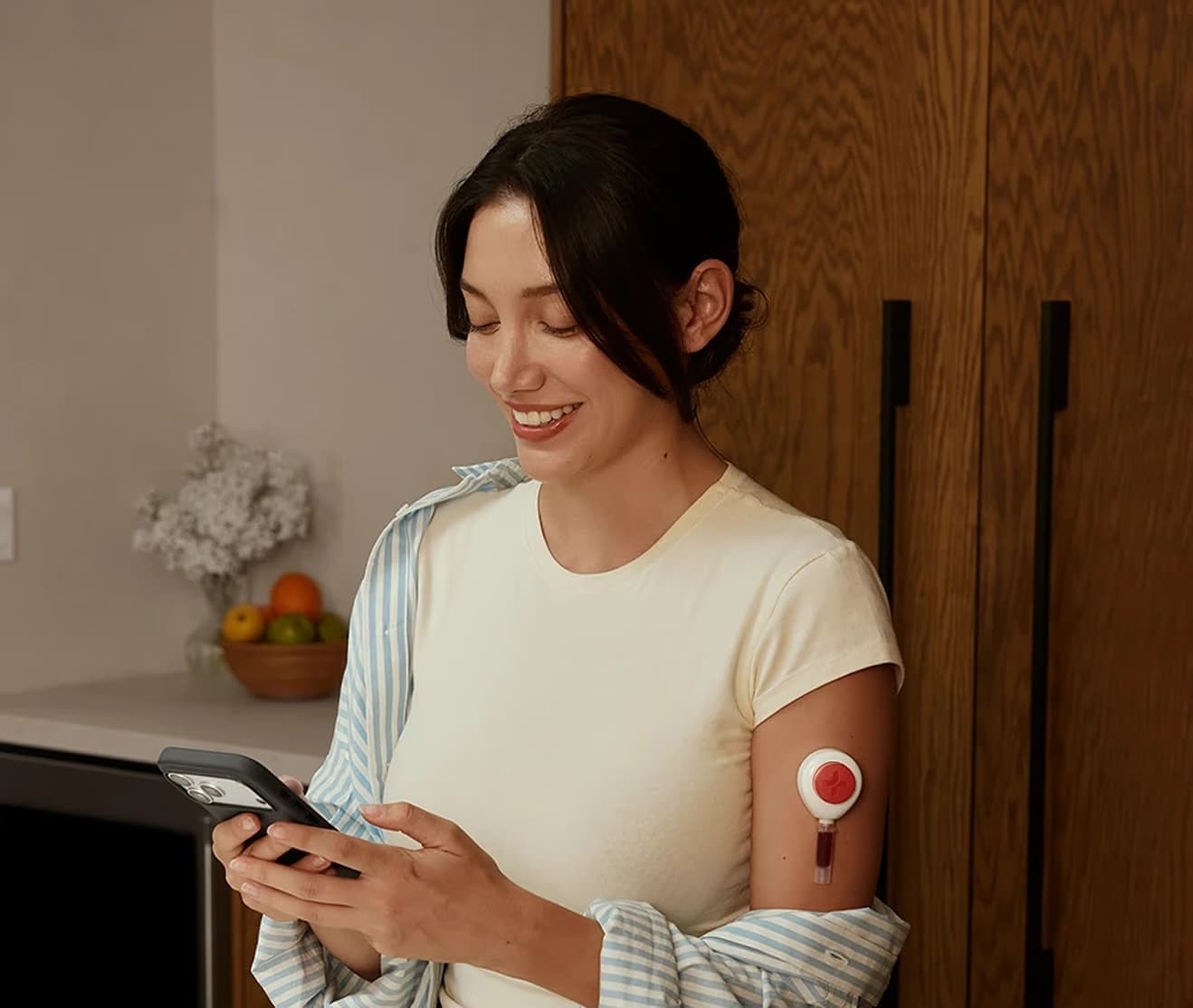 Woman checking blood test results on her phone